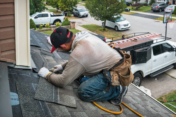 Professional Roofing technician working in Suttons Bay, MI